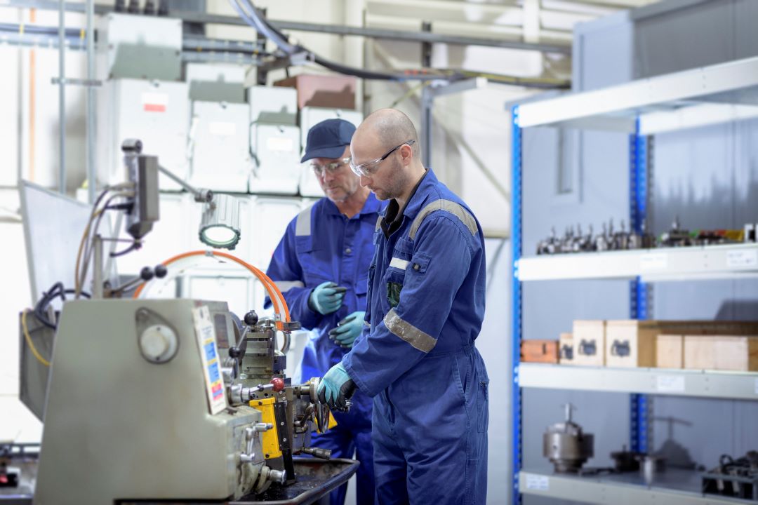 engineers-working-at-lathe-in-turbine-maintenance-2023-11-27-05-24-04-utc